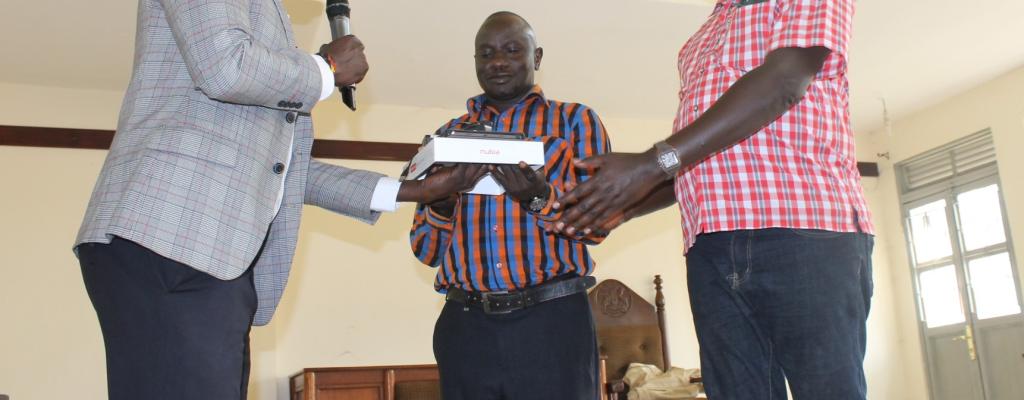 Handover Ceremony of tablets to Sub County Staff for PDM activities 